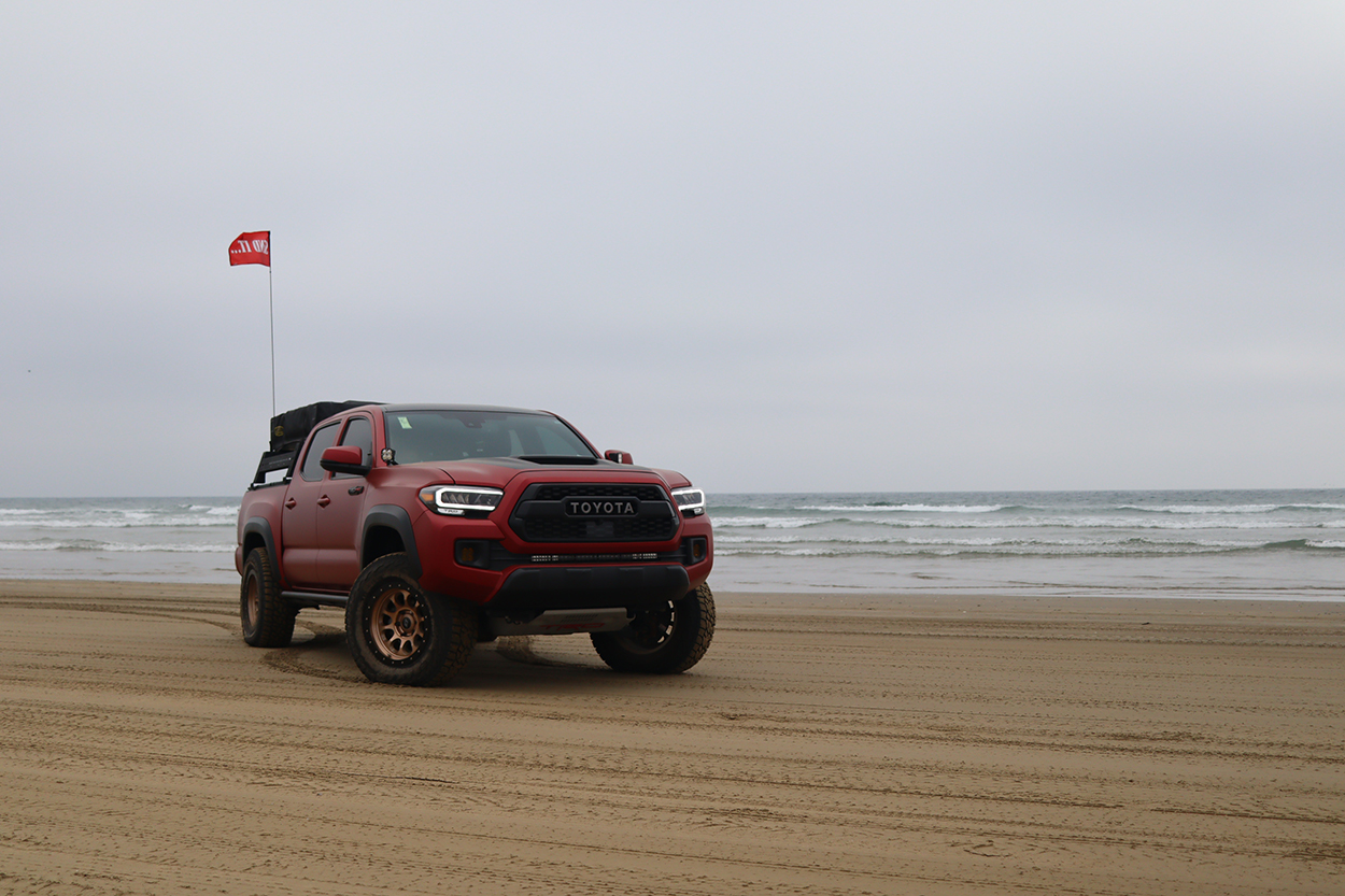 Red 3rd Gen Tacoma With Falken Wildpeak A/T3W Tires & Bronze Wheels