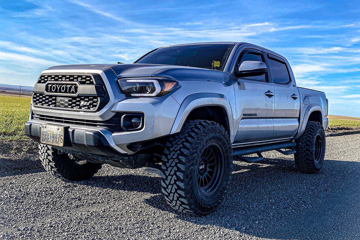 Lifted 3rd Gen Tacoma with Lasfit LED Switchback Fogs & Yokohama Geolandar M/T Tires