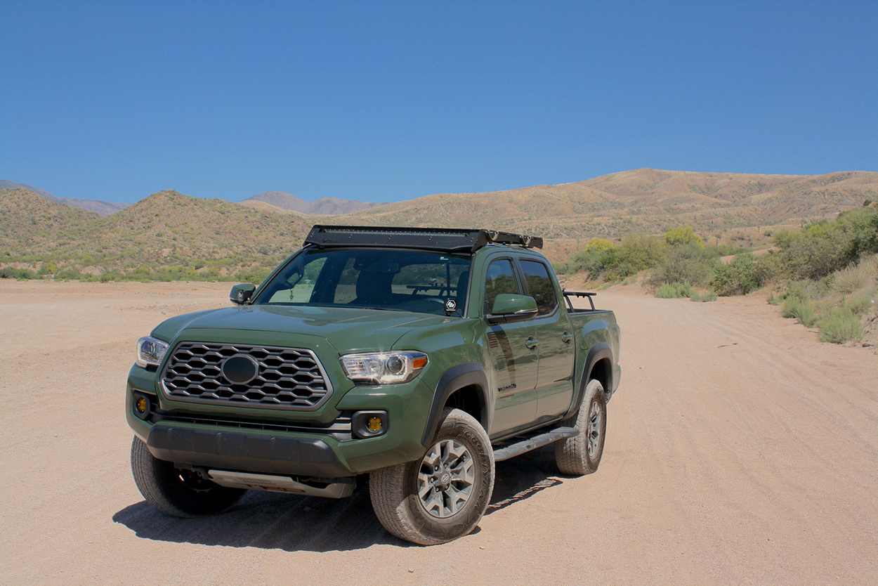 Army Green Tacoma With Roof Rack & Baja Designs Fog Lights