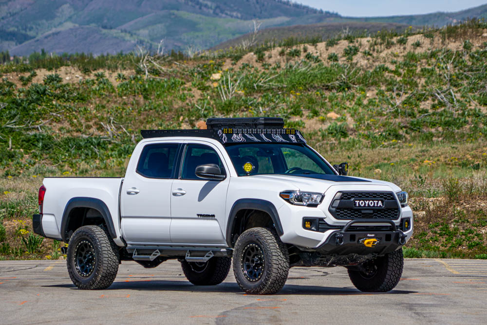 Lifted Super White 3rd Gen Tacoma with 4WP Front Bumper, & Vision X LED Lights