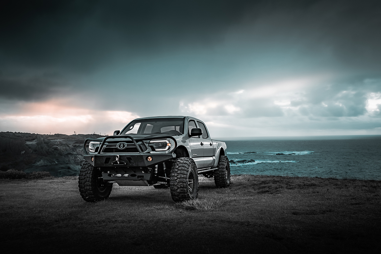 2nd Gen Tacoma With AlphaRex Alpha Black Headlights & Nitto Mud Grappler Tires