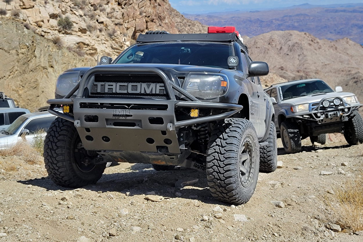 Black Lifted 2nd Gen Tacoma w/ BAMF Hybrid Front Bumper Tall Center Hoop