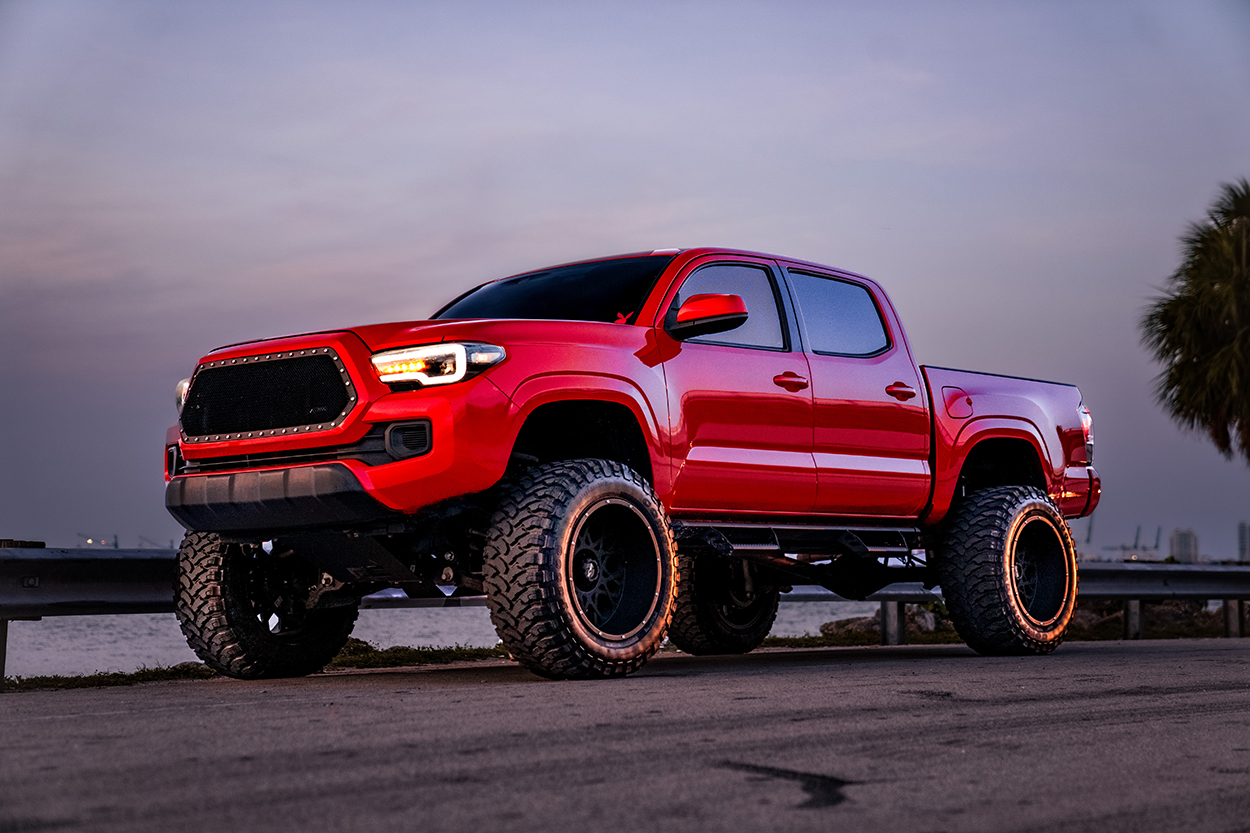 Barcelona Red 3rd Gen Toyota Tacoma w/ 6" Rough Country Drop Bracket Lift