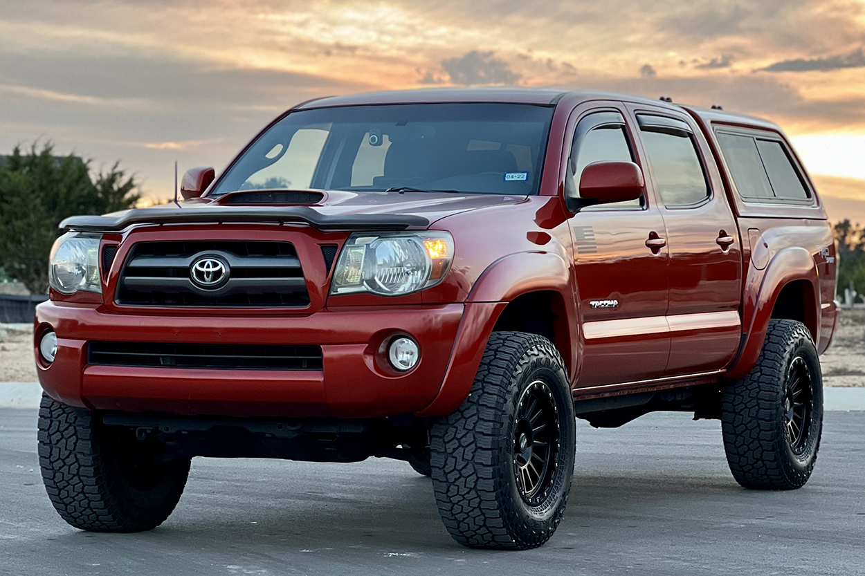 2nd Gen Barcelona Red Tacoma w/ Leer 100XR Camper Shell & Black Wheels