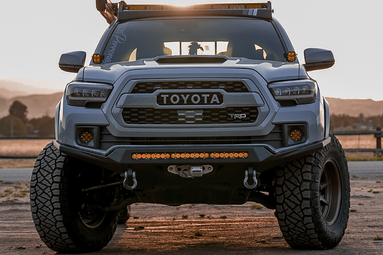 3rd Gen Cement Tacoma With SSO Slimline Full Plate Bumper & 305/70R17 Nitto Ridge Grappler Tires