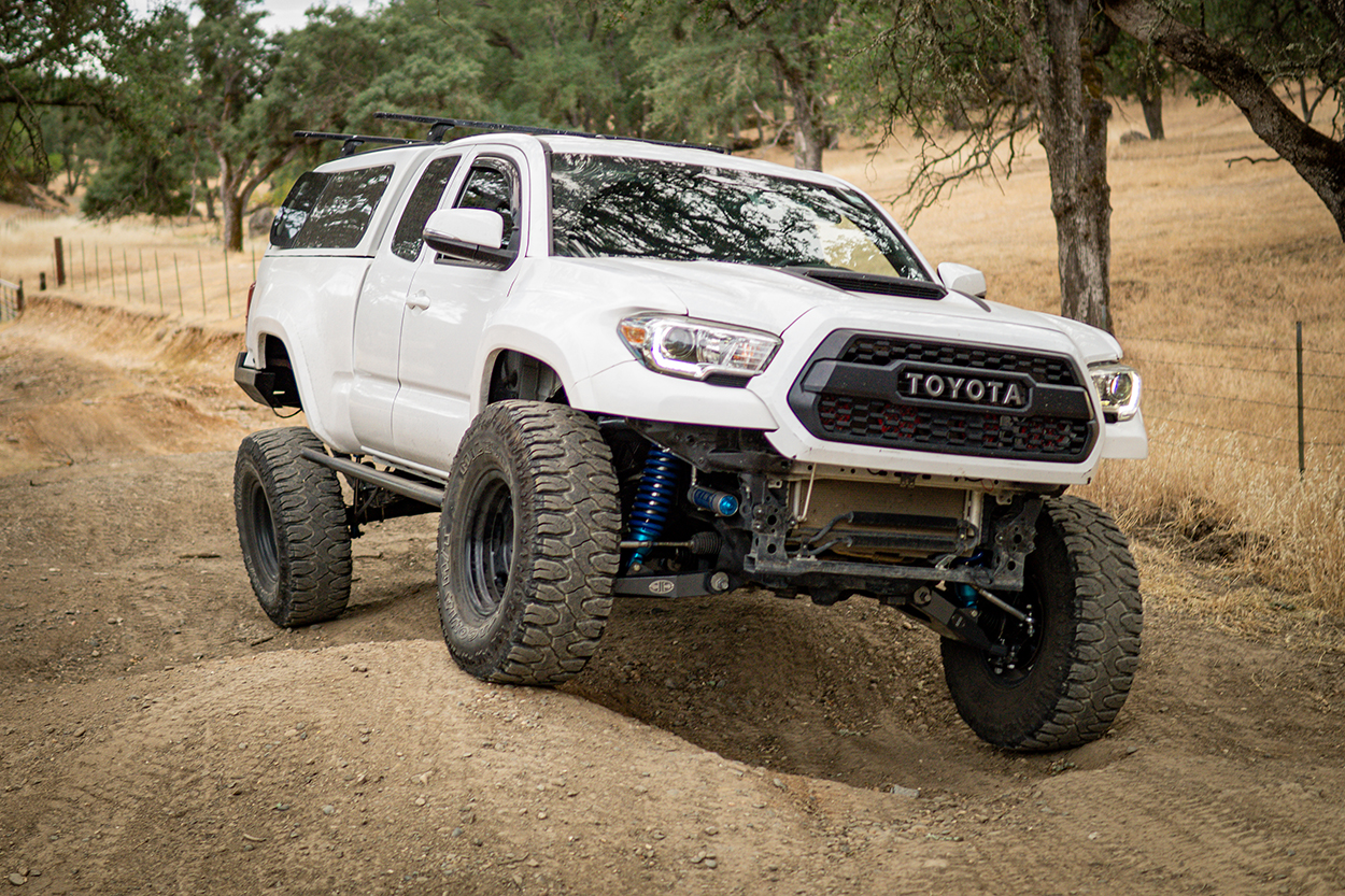 Long Travel White Tacoma With Milestar Patagonia M/T Tires, King Shocks