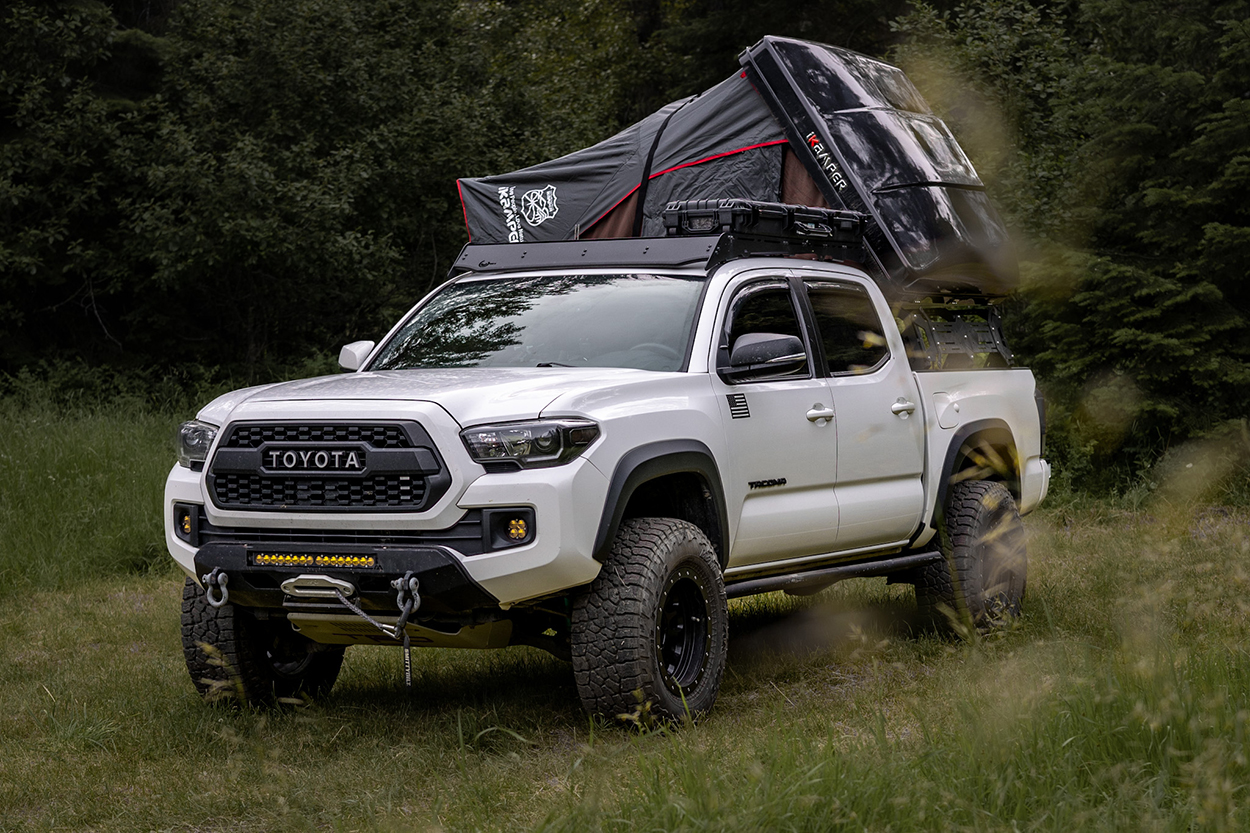 lifted White 3rd Gen Tacoma With Southern Style OffRoad Slimline Hybrid Bumper & iKamper Rooftop Tent