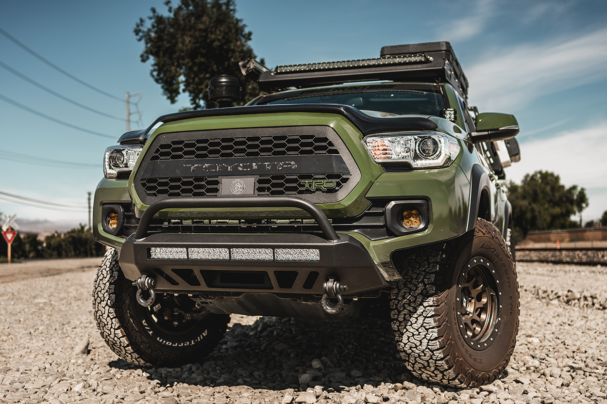 Lifted 3rd Gen Army Green Tacoma with Cali Raised LED Stealth Front Bumper