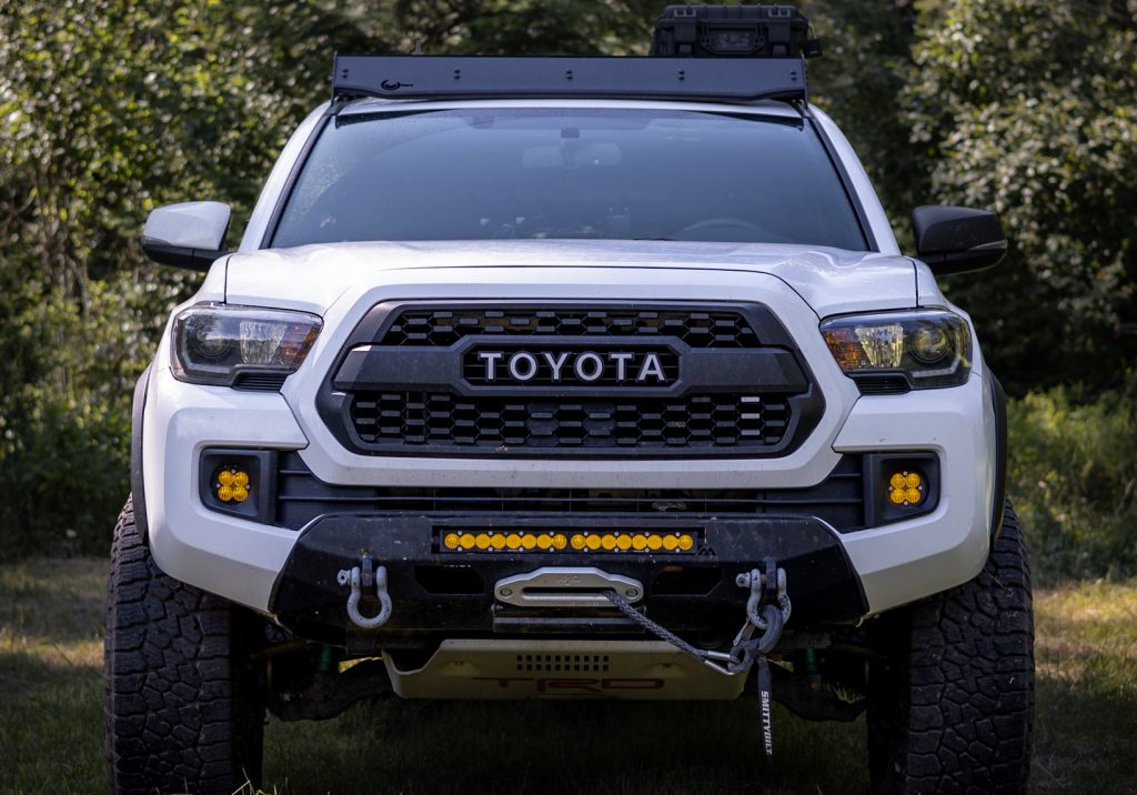 White 3rd Gen Toyota Tacoma w/ SSO Front Bumper & Baja Designs Lights