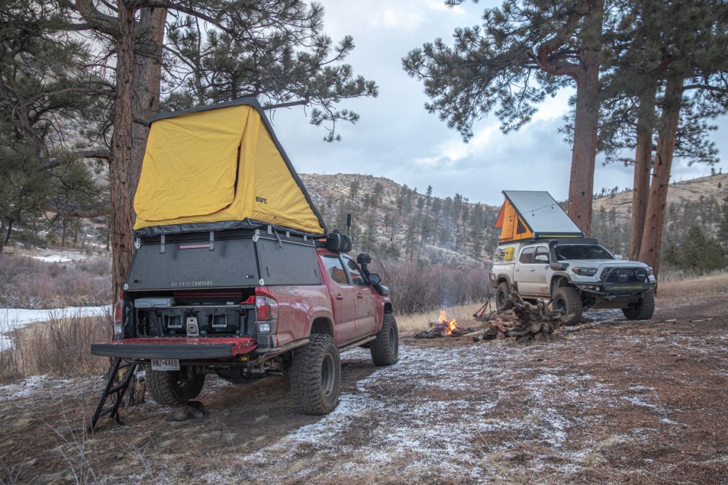 Red 3rd Gen Tacoma With Black GFC Platform Topper With Superlite RTT & White 3rd Gen Tacoma With White GFC Platform Camper