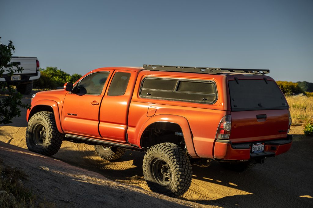 2nd Gen Inferno Access Cab Toyota Tacoma With Truck Cap & Black Wheels