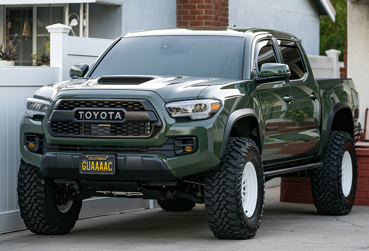 Army Green Tacoma with Yokohama G003 Geolandars 35s, White Dakar Wheels