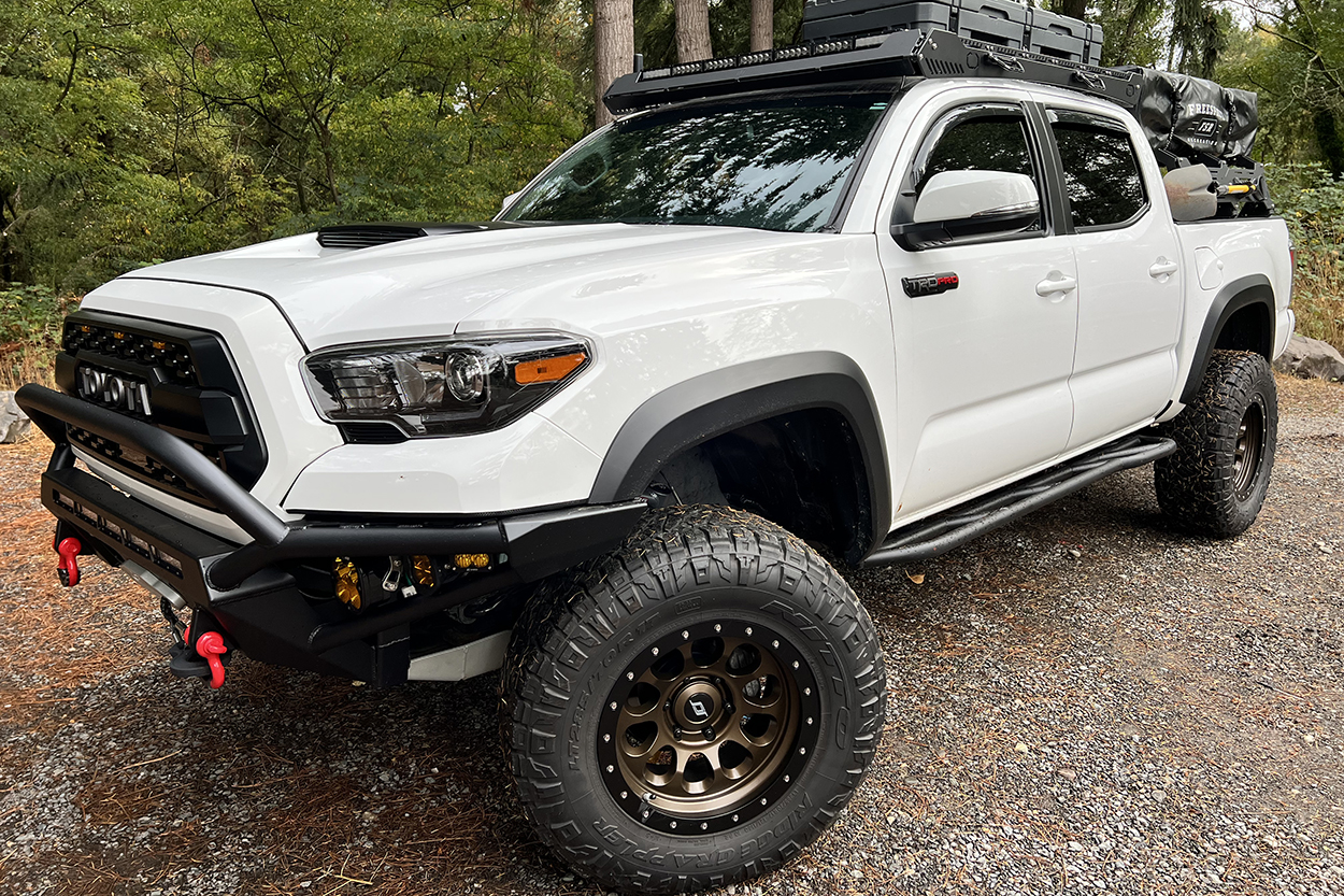 3rd Gen Tacoma with Relations Race Wheels V3 Rock Sliders