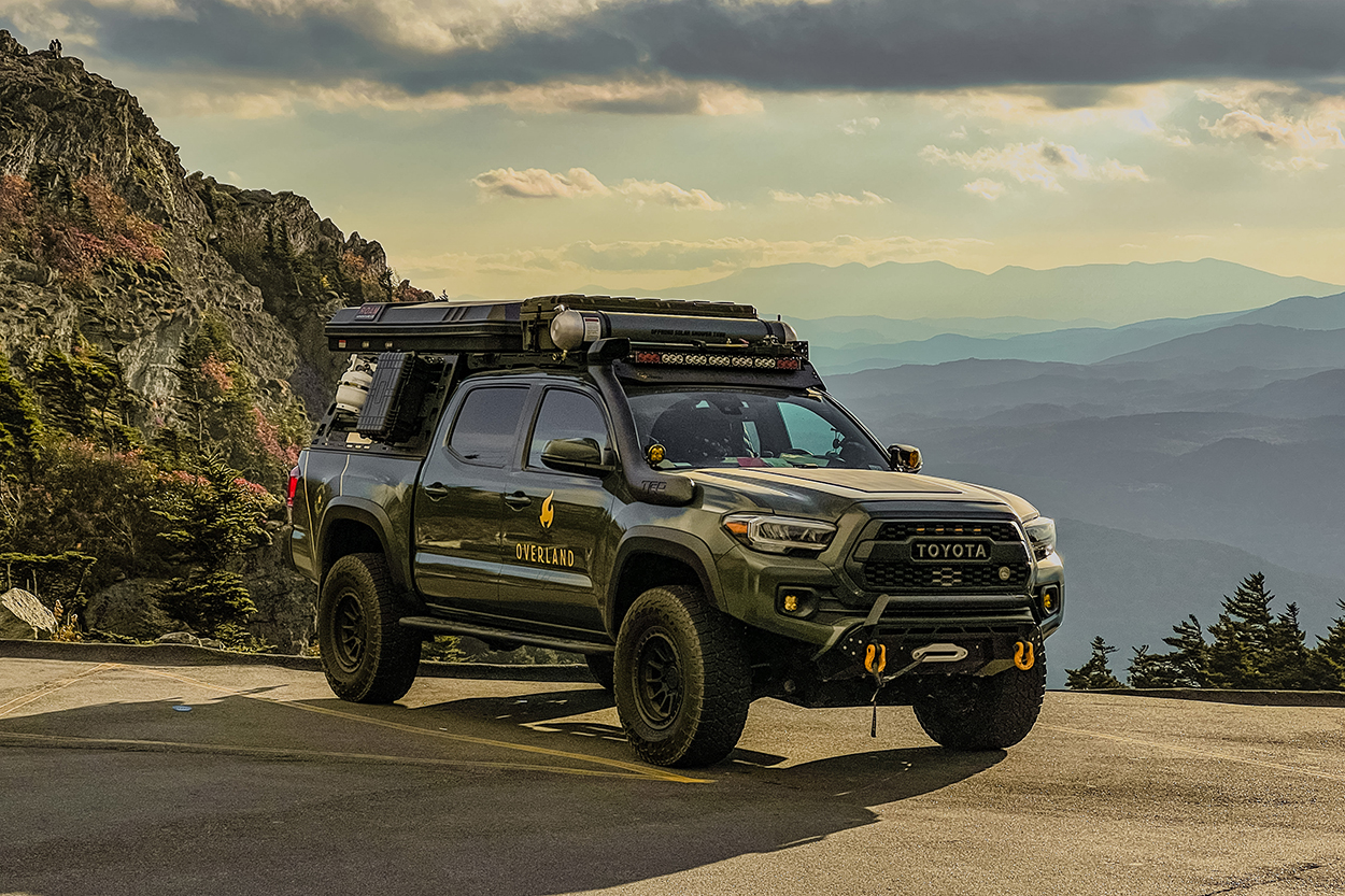 Army Green Tacoma with CBI Off-Road Overland Sliders w/ Kick Out