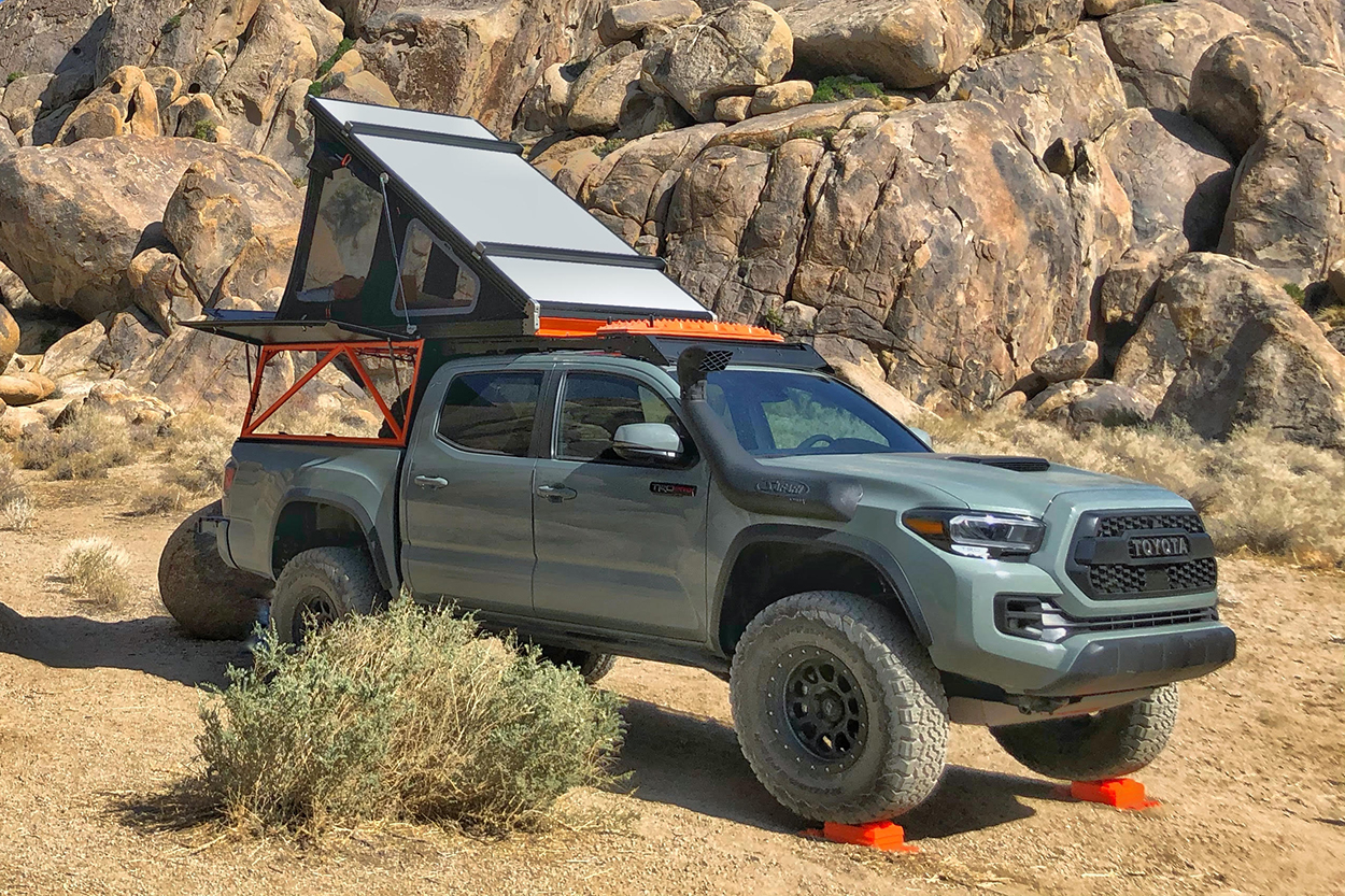 Lunar Rock TRD Pro 3rd Gen Tacoma with GFC Go Fast Camper V1 With Orange Space Frame