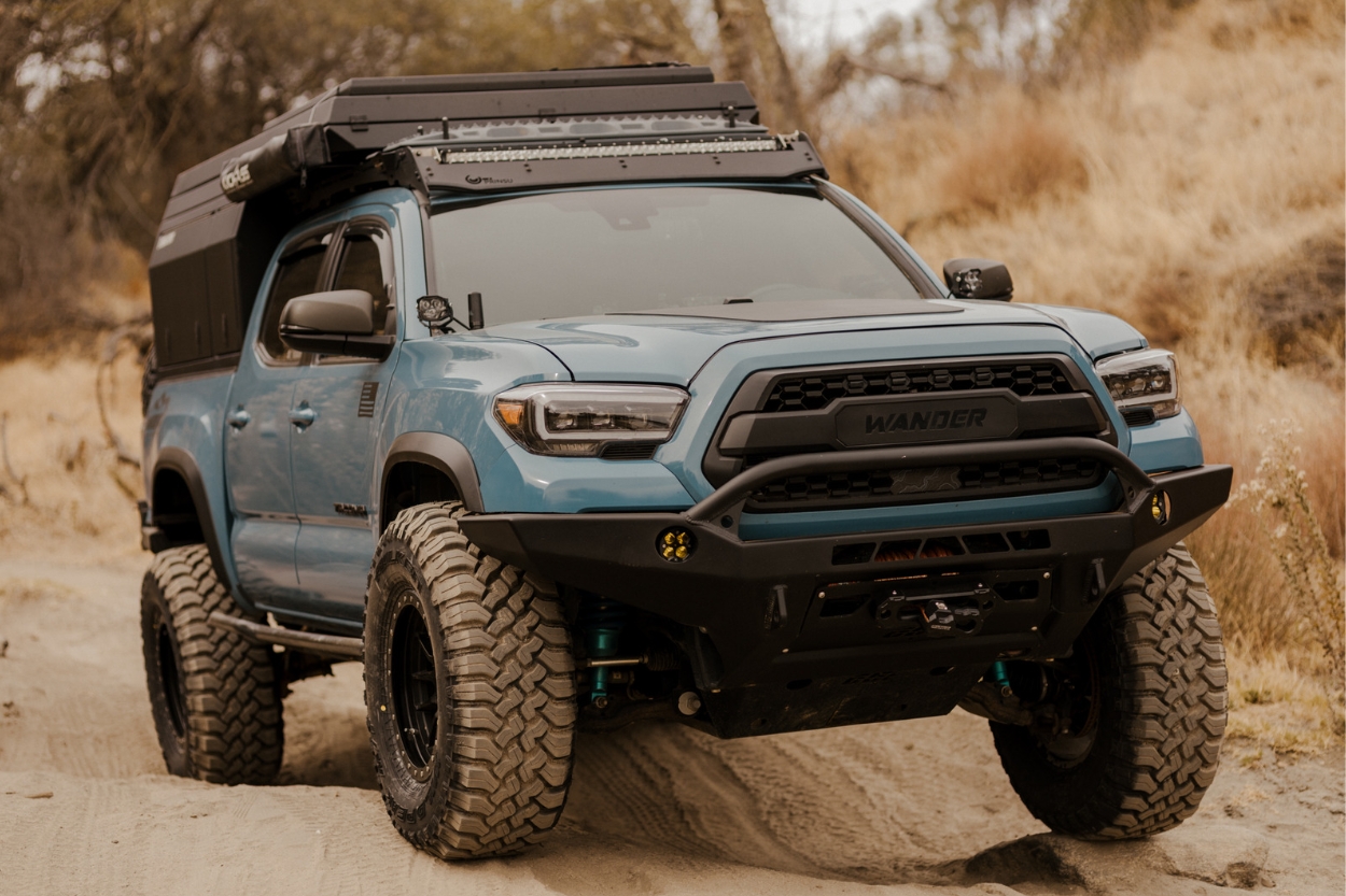 3rd Gen Tacoma with Falken MT 35” tires & TrailFort Truck Bed Camper