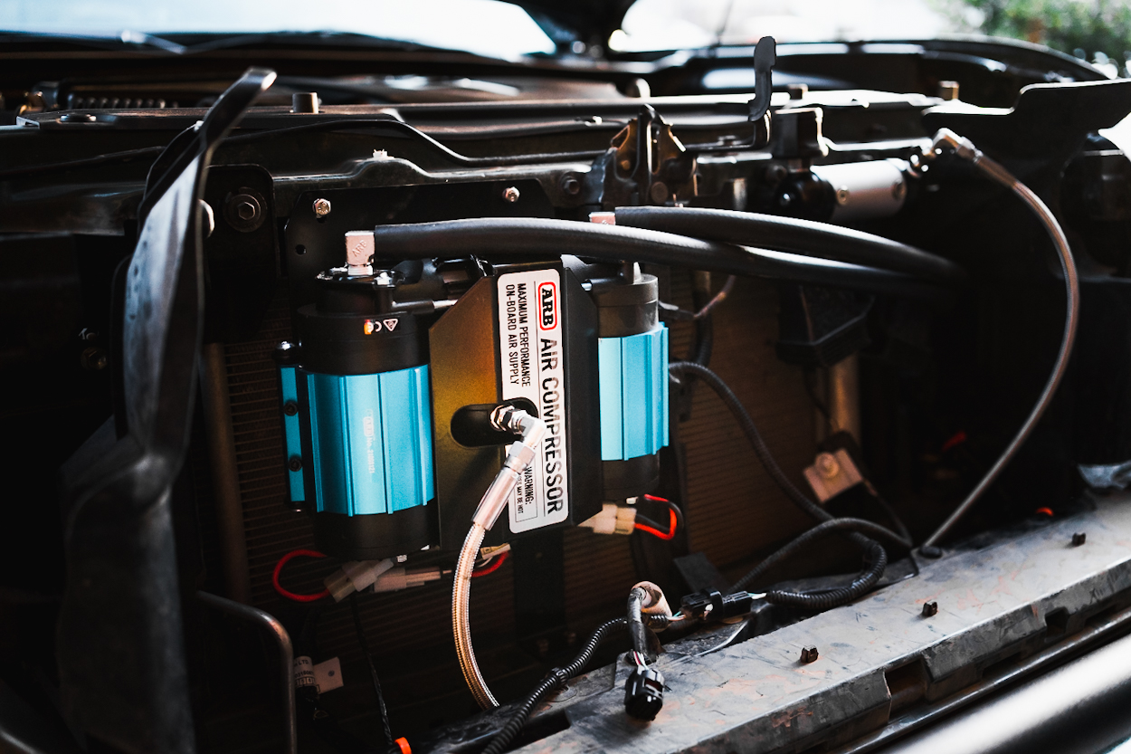 ARB Twin Air Compressor Mounted On R4T Behind The Grille Mount For Toyota Tacoma