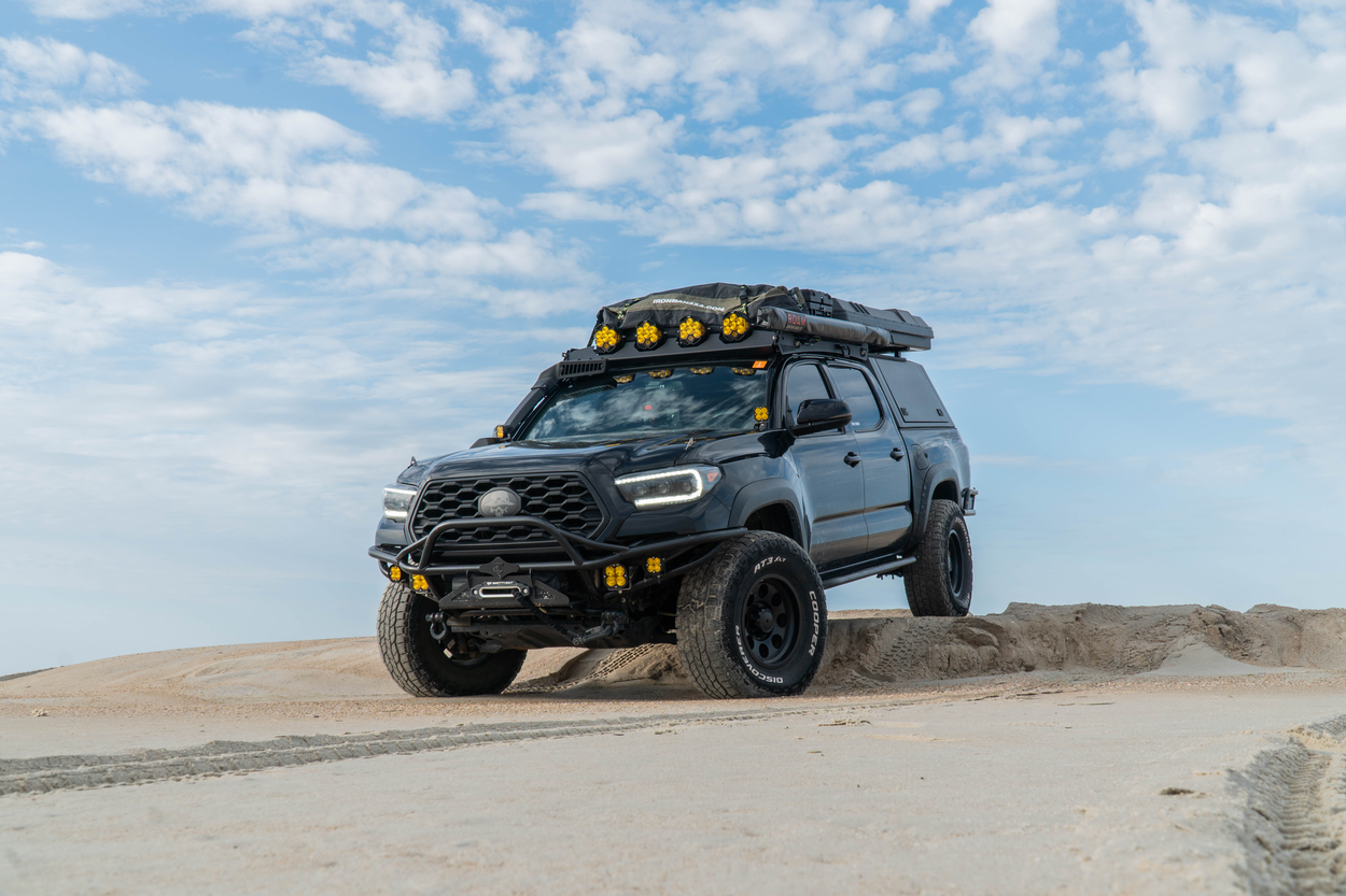 Lifted Black 3rd Gen Tacoma Overland Build With Yellow LED Lights