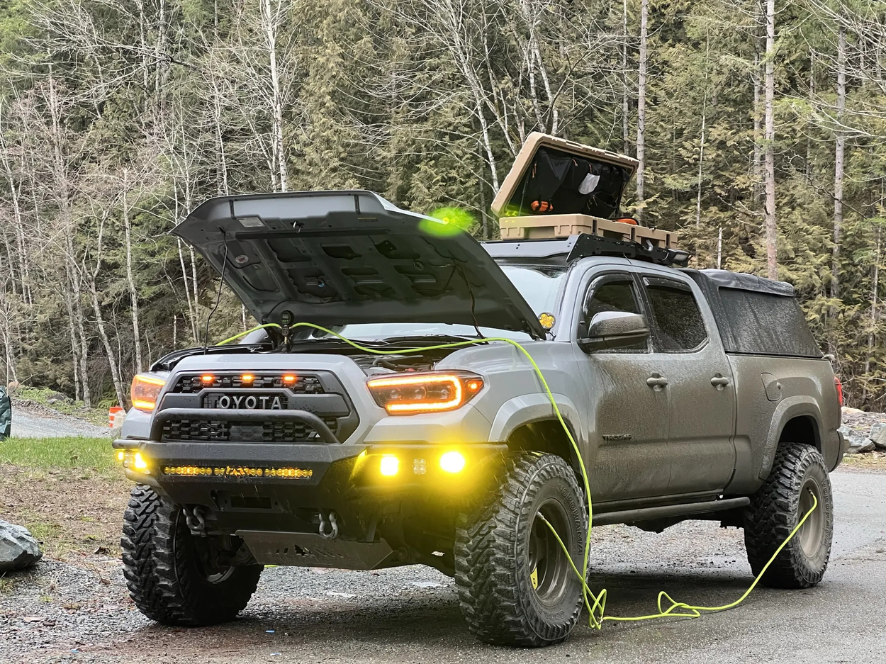 Lifted Cement 3rd Gen Tacoma With Amber LED Lights & Soft Truck Bed Topper