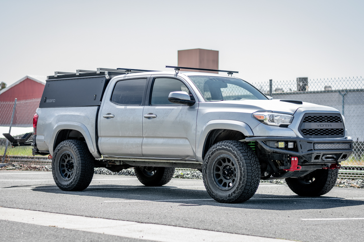 Black GFC (Go Fast Campers) Topper On TRD Sport 3rd Gen With Off-Road Front Bumper & Oversized Off-Road Tires