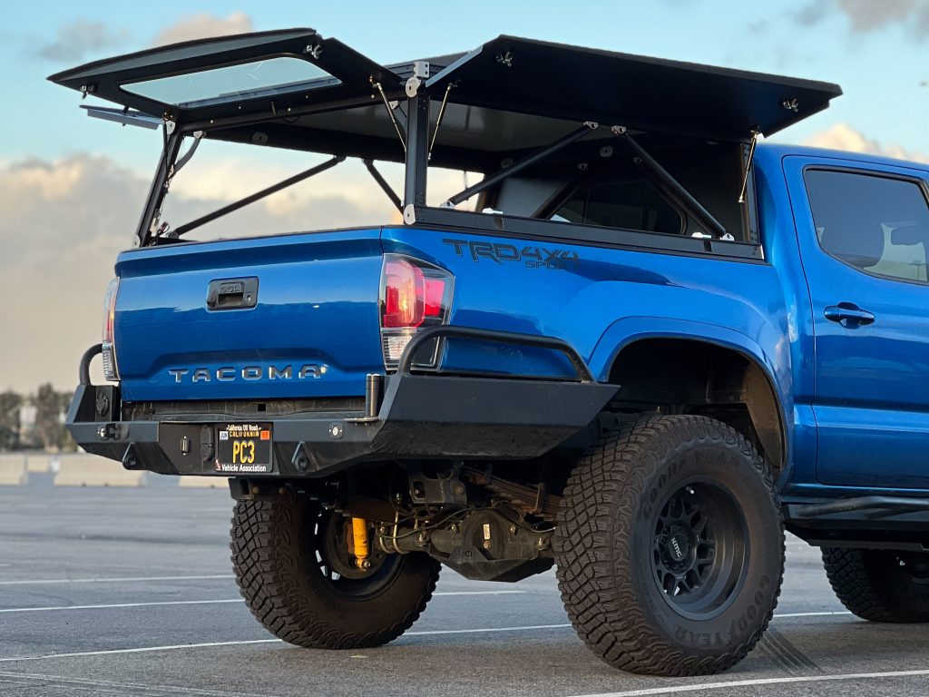 Aluminum Space Frame Construction - GoFastCampers Black Platform Topper On Blue 3rd Gen Tacoma