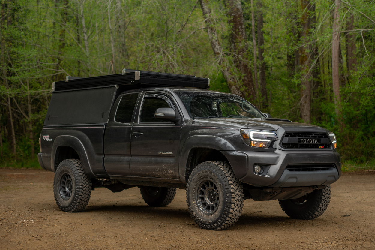 Lifted 2nd Gen Tacoma With Black GFC Camper With Pizza Cutter Tires (255-85-16)