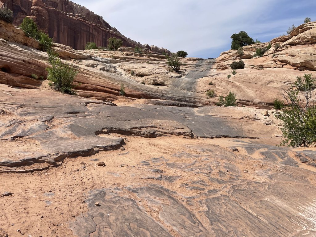 Wipeout Hill slick rock 4x4 climb at the end of Wipeout Hill Loop trail in Moab, Utah.