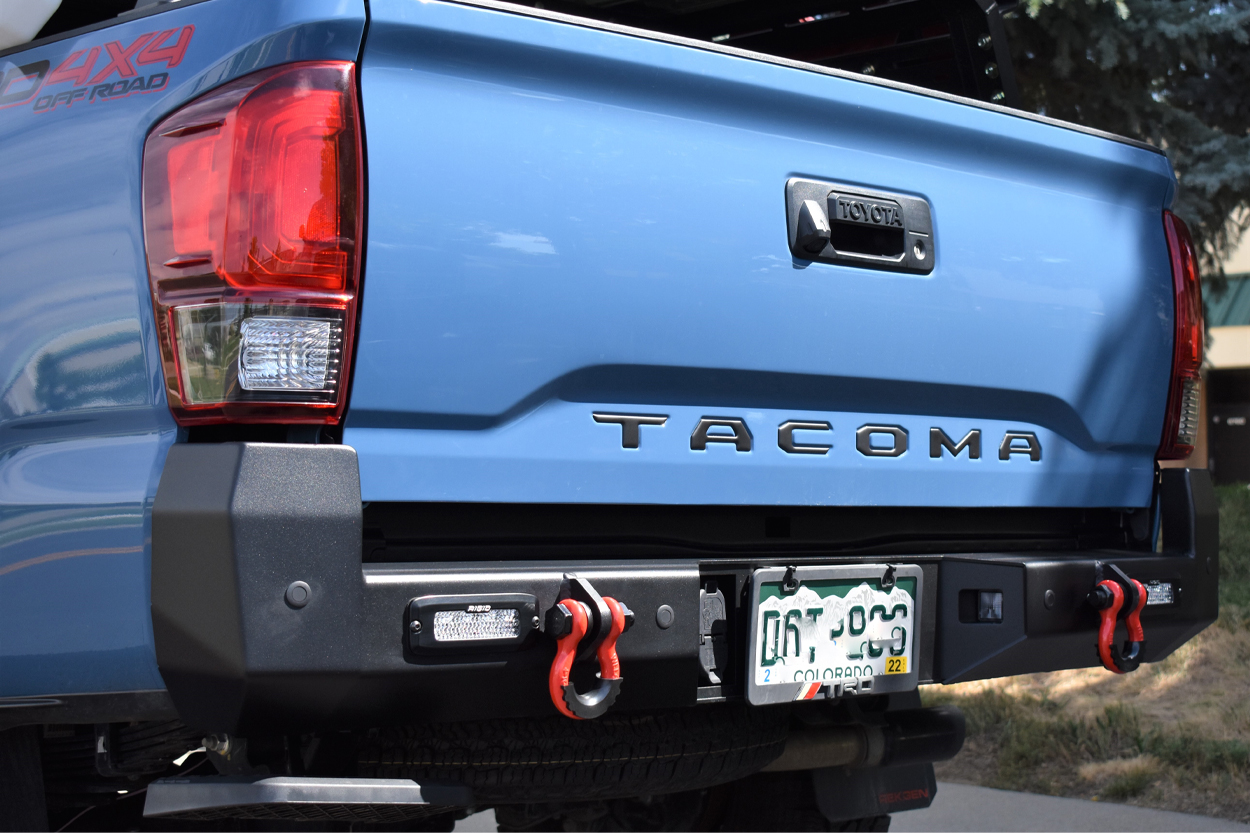 RCI Metalworks Steel, Heavy-Duty Off-Road Rear Bumper Installed on Voodoo Blue 3rd Gen Tacoma - Integrated Shackle Mounts, Hidden Hitch Receiver, and Flush Mounted Auxiliary Lighting