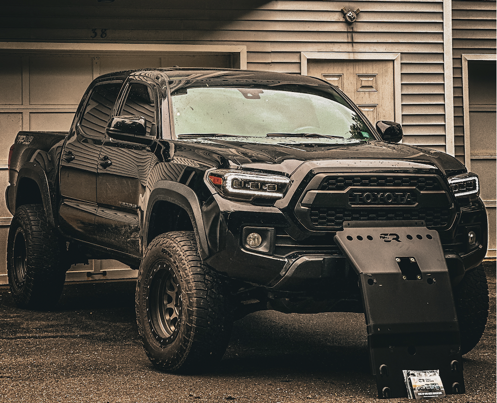 Lifted Black 3rd Gen Tacoma With Cali Raised LED Aluminum Front skid Plate