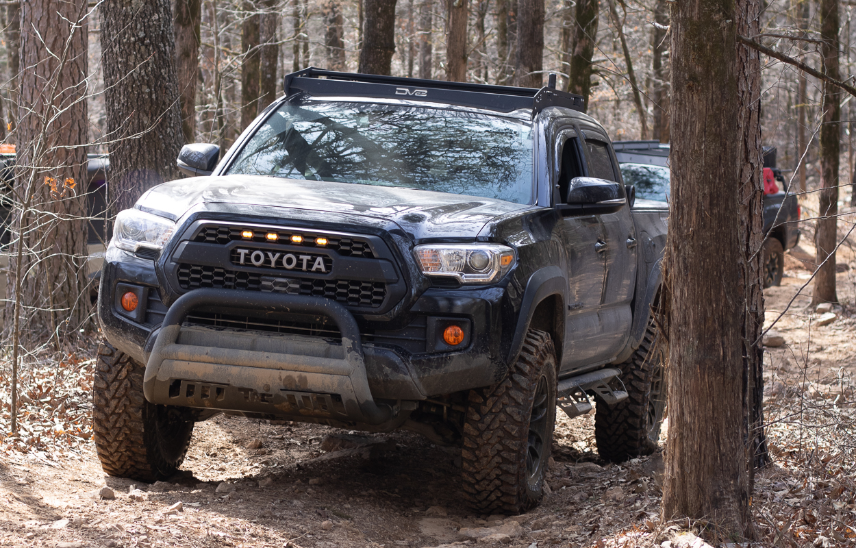 Yokohama Geolandar G003 M/T on Toyota Tacoma in Forest