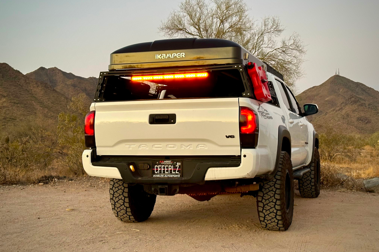 White 3rd Gen Tacoma With Amber Chase Light Bar From Amazon