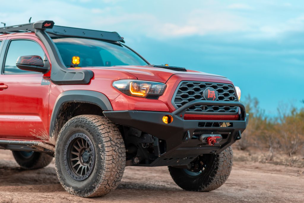 Barcelona Red Lifted 3rd Gen Tacoma Overland Build With Airaid Snorkel, Bronze RRW RR7 Wheels & CBI Baja Front Bumper