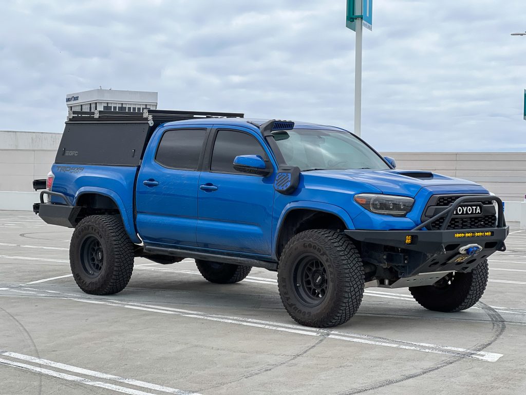 Black Go Fast Campers Platform Topper On Blue 3rd Gen Tacoma Off-Road Build