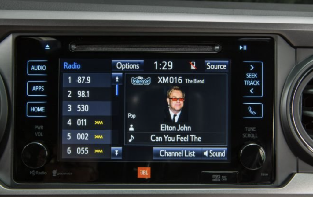 Toyota Tacoma Entune Infotainment System on the Radio page with Elton John playing
