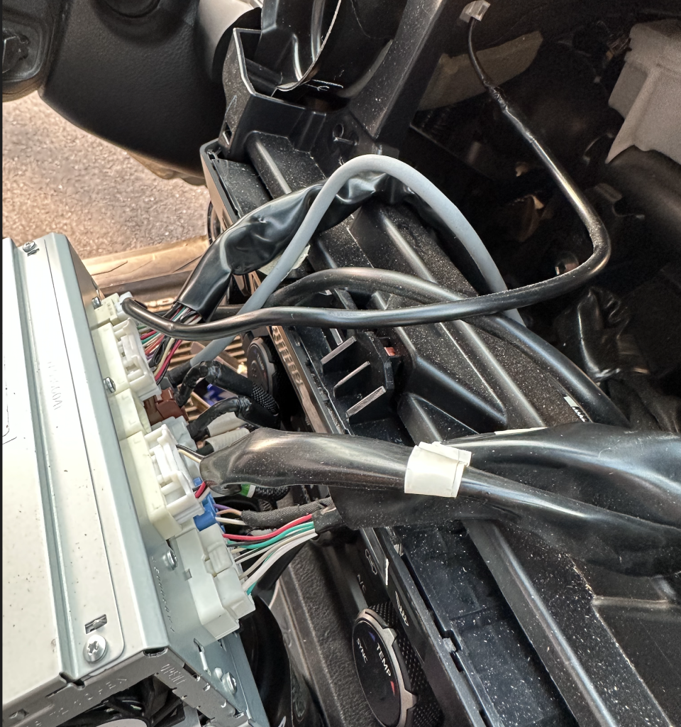 OEM Head unit wiring for the Toyota Tacoma once the head unit has been removed