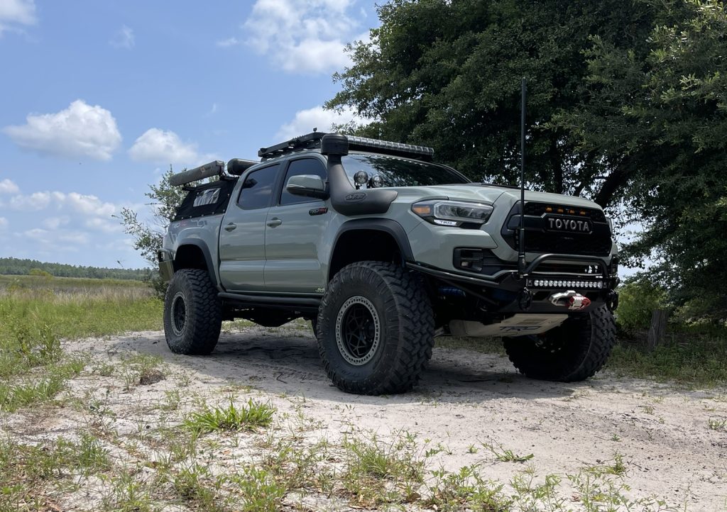 Lunar Rock Tacoma Build With Total Chaos Long Travel & 37" Mud Terrain Tires