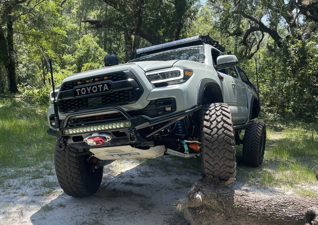 Lunar Rock Toyota Tacoma With Long Travel & 37 Inch Tires