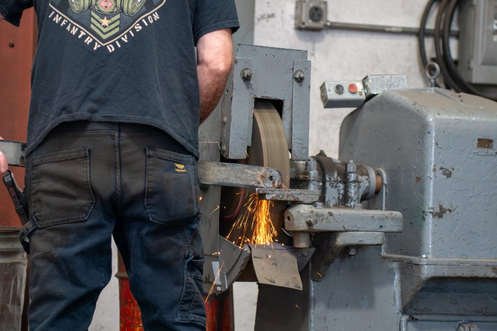 Grinding Down Leaf Spring to Form a Custom Leaf Pack