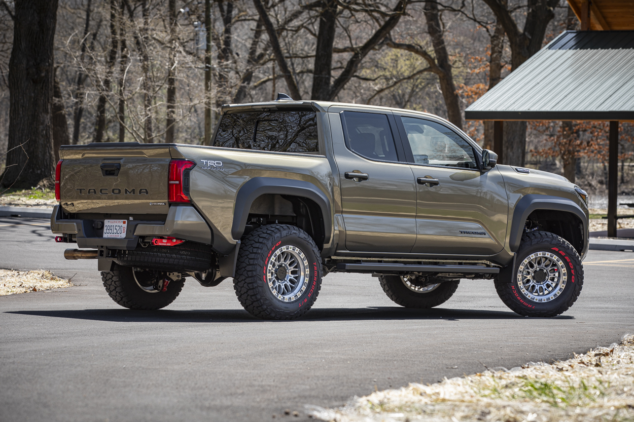 33x12.5x17 Tamarock RT With Red Lettering On Bronze Oxide 4G Tacoma