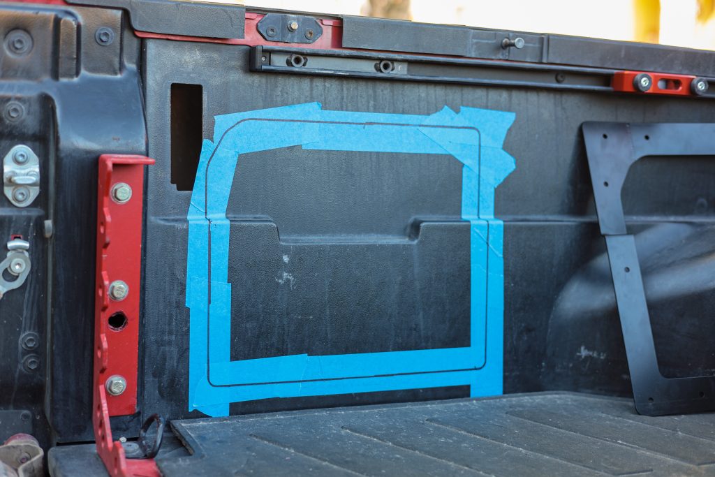 Blue Painters Tape on Tacoma Bed For Cutting