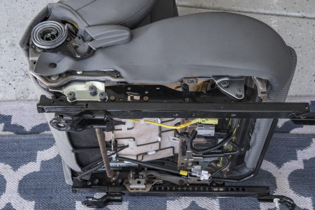 Removing OEM Seat Slider For New Suspension Seats On Tacoma