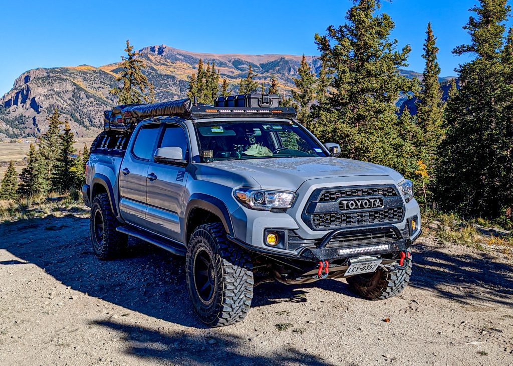 3rd Gen Tacoma with Pelican Vault Case, Plano 108 quart Sportsman Trunk, and Tough Storage Tote 14 Gal